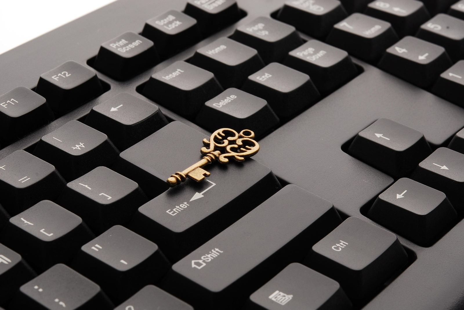 Working the numbers at a laptop - illustrative