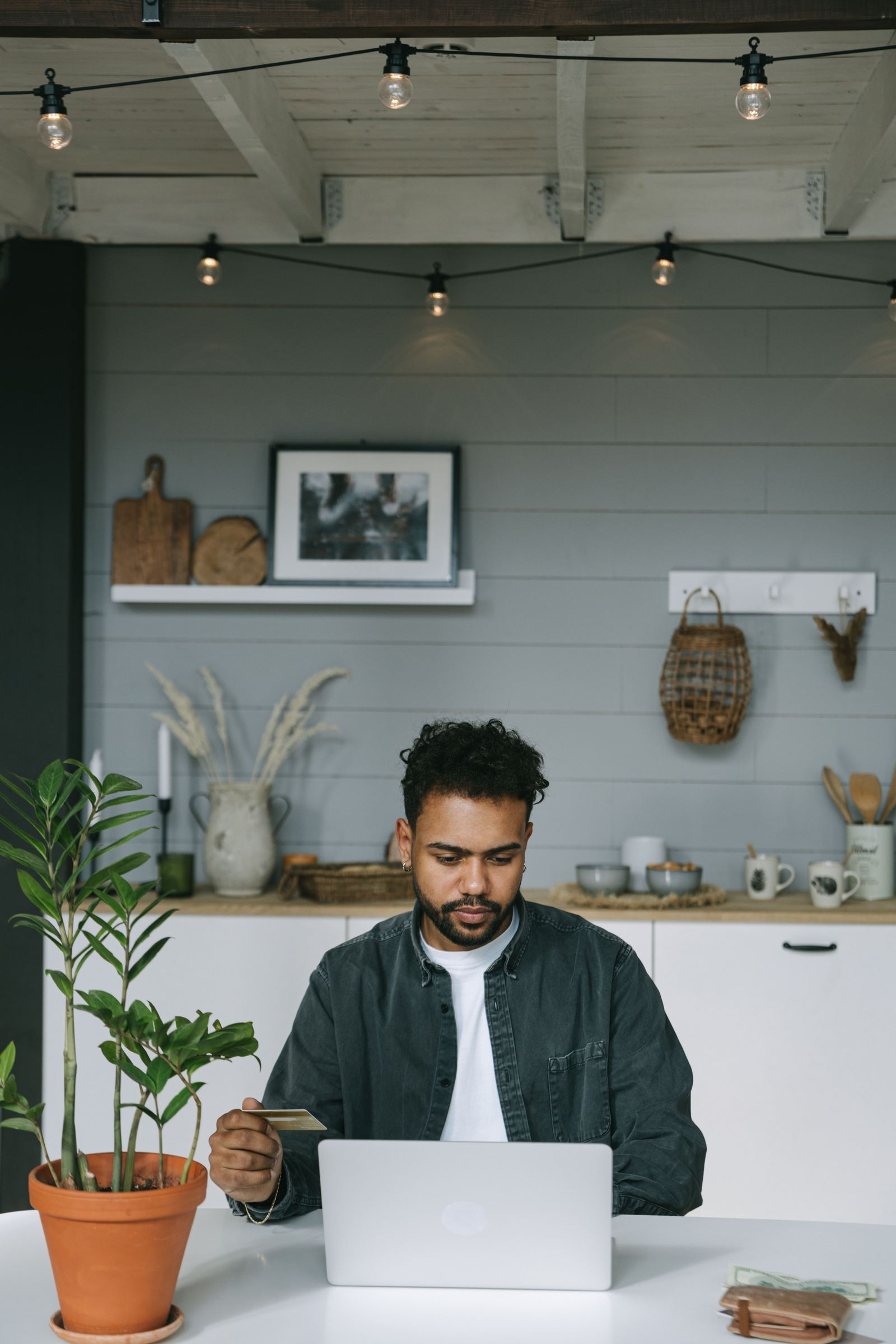 Working the numbers at a laptop - illustrative