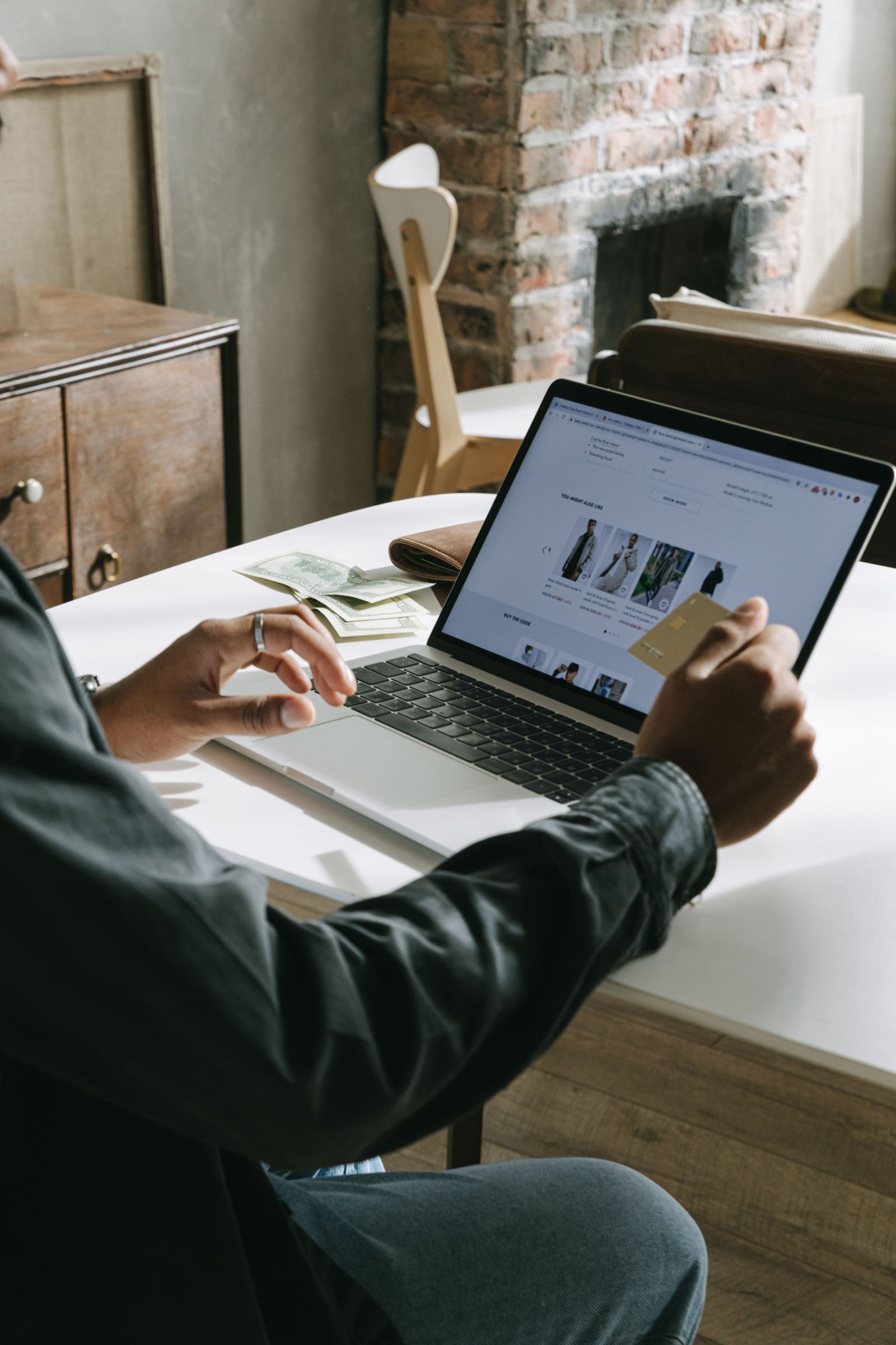 Working the numbers at a laptop - illustrative